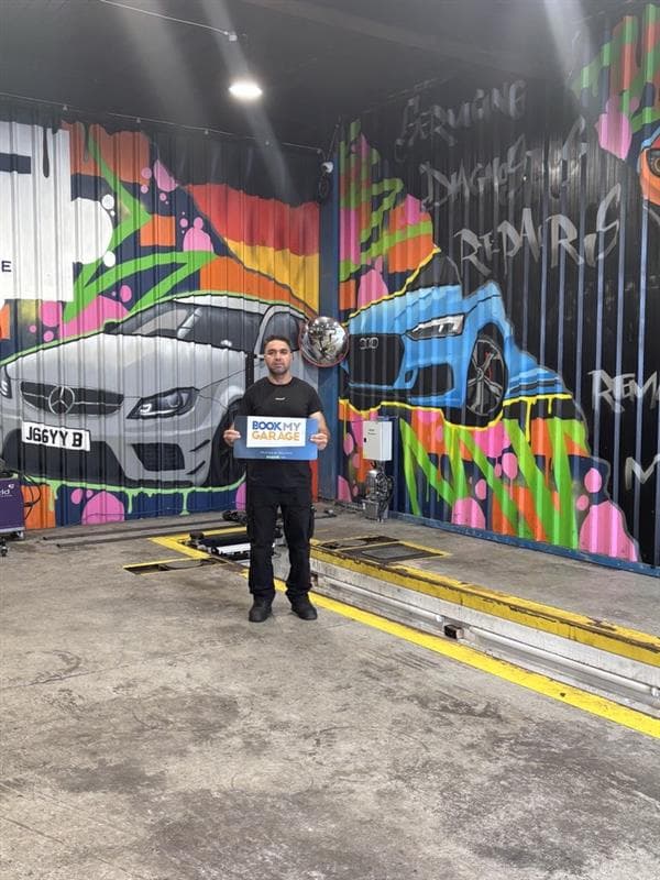 Mechanic working on a car